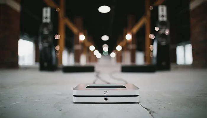 Bluesound NODE X, on concrete floor at Toma Audio