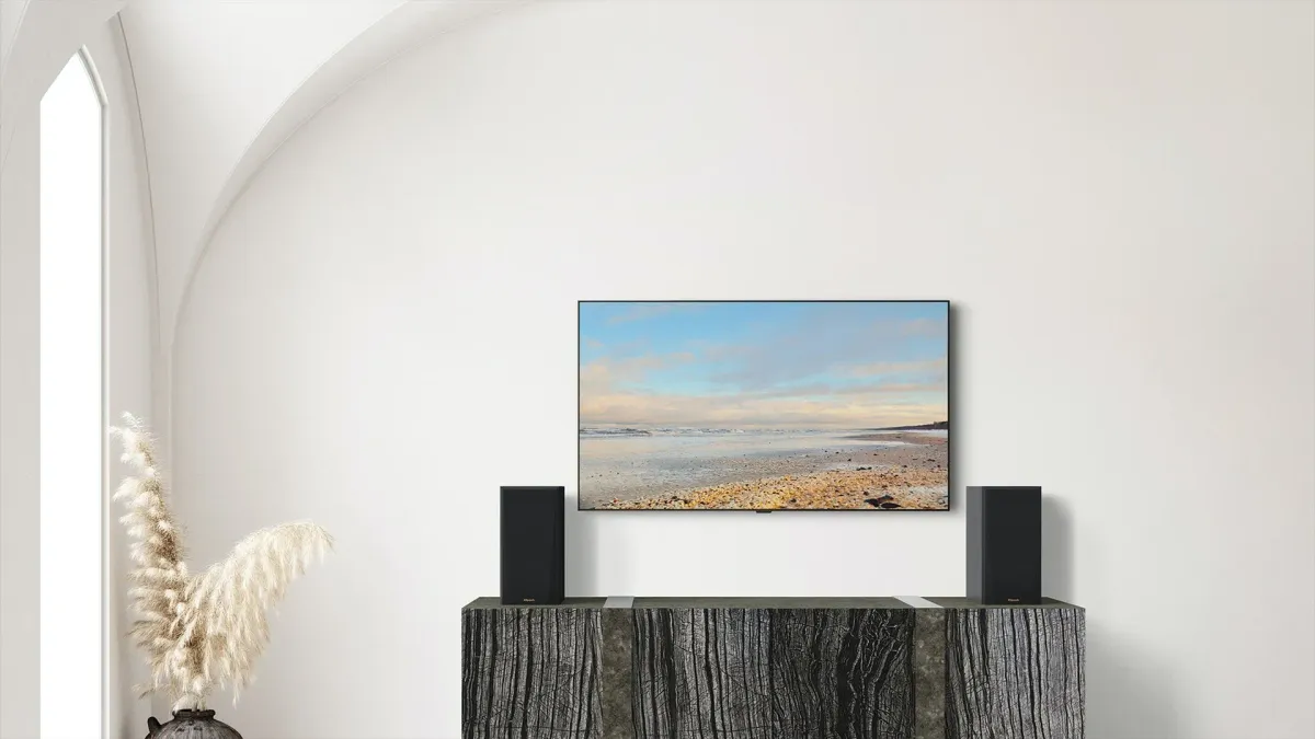 Klipsch RP-500M II - [2-way Horn 5.25"], RP 500M II On A Dark Grey Wooden Credenza Under A TV at Toma Audio